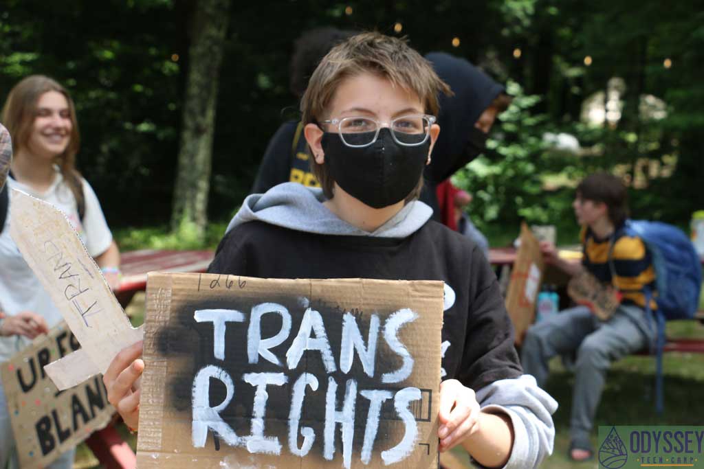 Camper with a "Trans Rights" sign