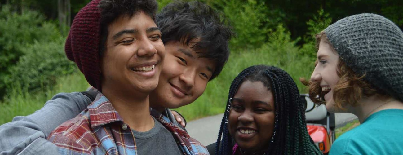 Group of teens from varied ethnic backgrounds