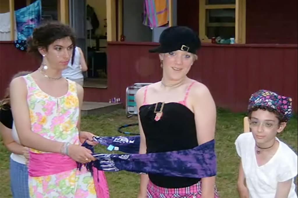 Three campers dressed in drag