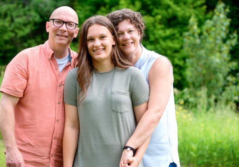 Teen with two parents